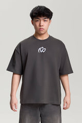 Front view of gray NV Loose T-Shirt with white logo – minimalist streetwear by TURN ENVY TO LOVE